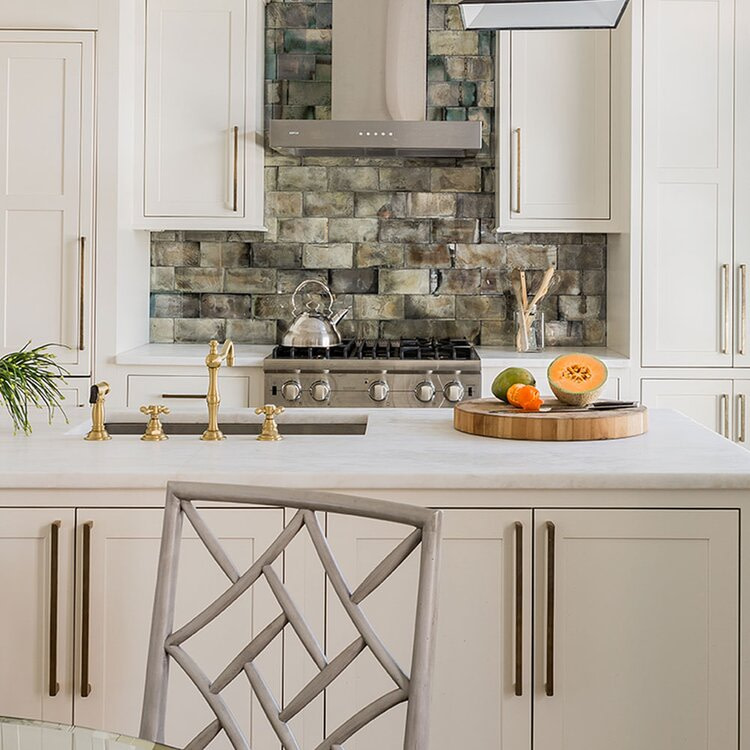 kitchen with natural stone backsplash tile